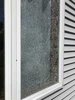 Broken house window made with safety glass